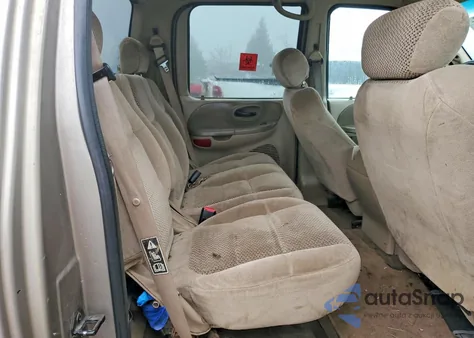 2001 Ford F150 Supercrew z USA, uszkodzony, nr VIN 1FTRW08L91KB68097